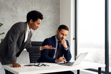 Coworkers working at modern office