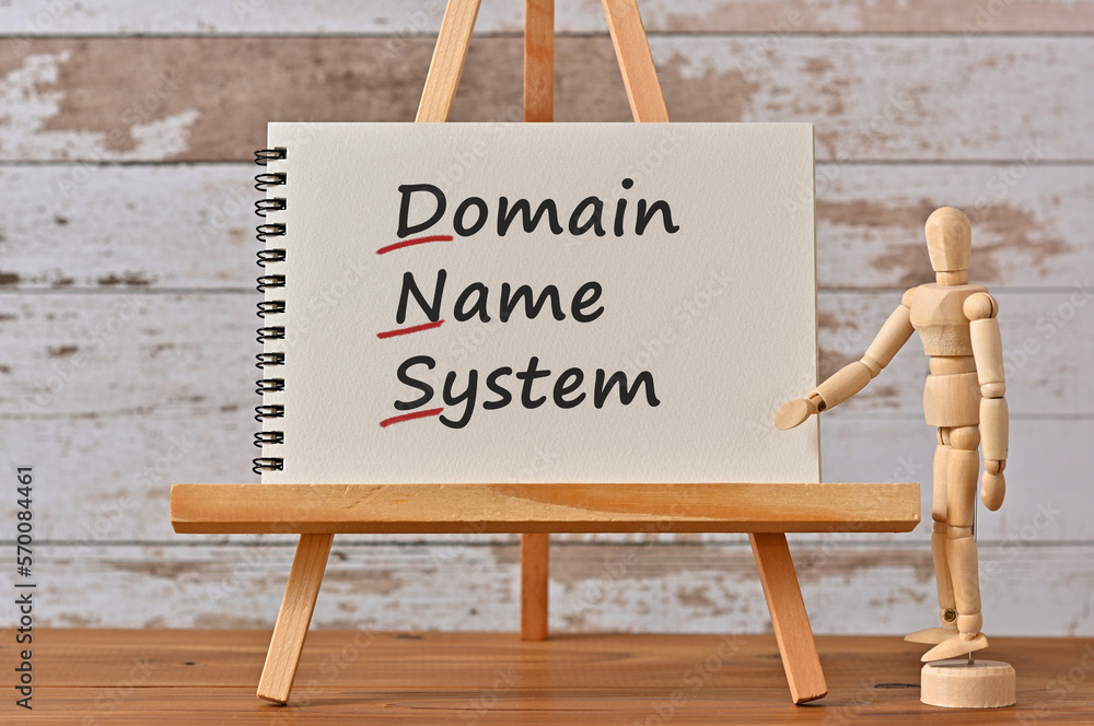 Poster there is notebook with the word domain name system. it is an eye-catching image.