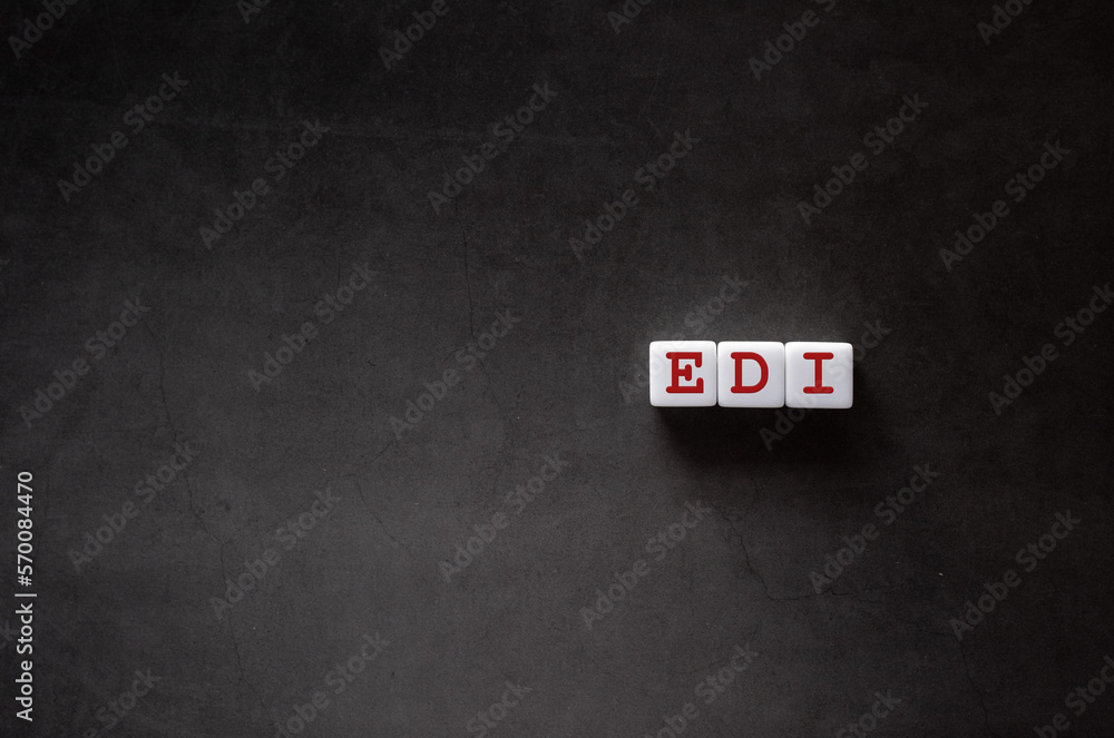 Poster there is white cube with the word edi. it is an abbreviation for electronic data interchange as eye-