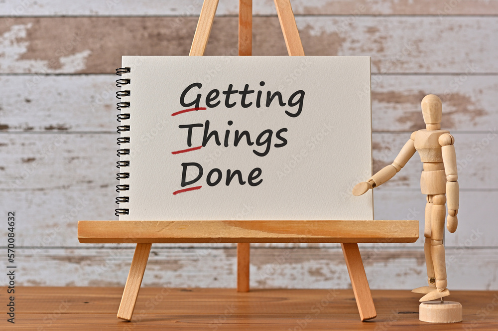 Poster there is notebook with the word getting things done. it is an eye-catching image.