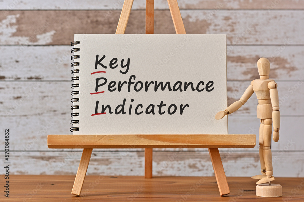 Poster there is notebook with the word key performance indicator. it is an eye-catching image.