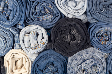 Rolls of jeans, denim texture. Texture of denim fabric.