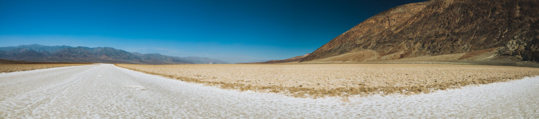 Panorama of the Bad Water Basin area, in Death Valley, on a smoky day