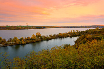 Fototapeta na wymiar evening autumn sunset over the rive