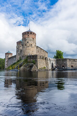 Fototapeta na wymiar Medieval castle of Olavinlinna by the lake, Savonlinna, Finland