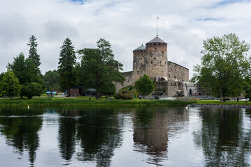 Fototapeta na wymiar Medieval castle of Olavinlinna by the lake, Savonlinna, Finland