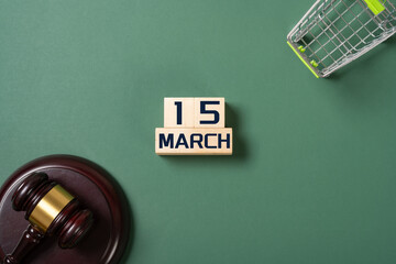 MARCH 15 and shopping cart and judge gavel concept of world consumer rights day