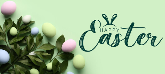 Easter greeting card with branches and painted eggs on green background