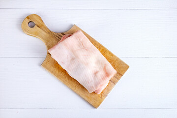 Pork lard on a wooden board 