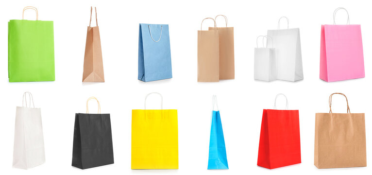 Collection of paper shopping bags on white background