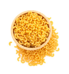 Wooden bowl of uncooked elbow pasta isolated on white background