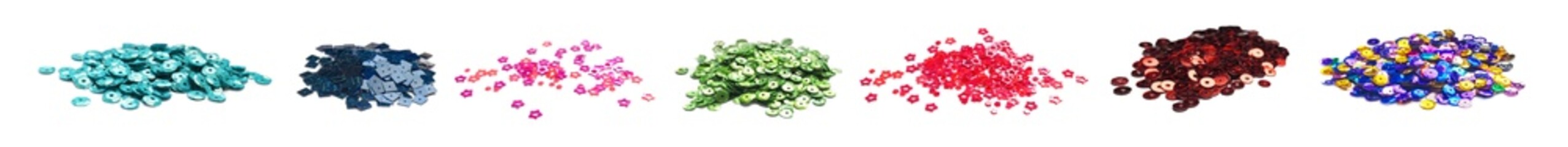 Fototapeta premium Set of different shiny sequins on white background