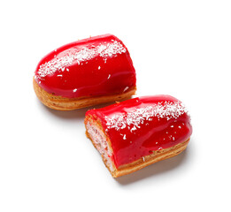 Halves of delicious eclairs isolated on white background
