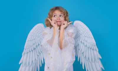 Beautiful little angel. Isolated studio shot. Cute Pretty child with angel wings. Cupid, valentines...