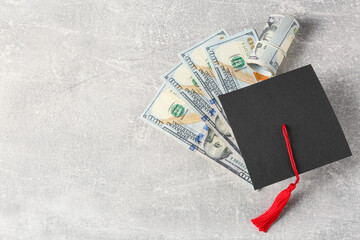 Scholarship concept. Graduation cap and banknotes on light grey table, flat lay with space for text - obrazy, fototapety, plakaty