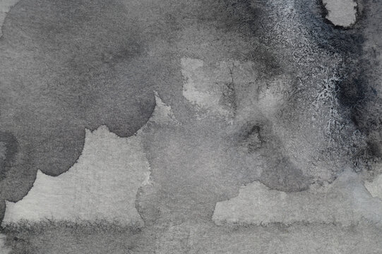 Abstract grey watercolor painting as background, top view