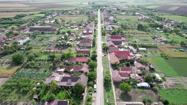 Drone Ascending Over Rural Cenei Village in Romania