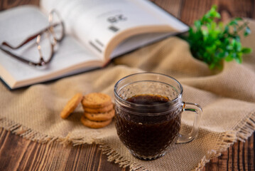 cup of coffee with cookies