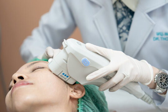 Beautician procedure by electric device,Ultrasound therapy treatment for skin tightening in aesthetic clinic.