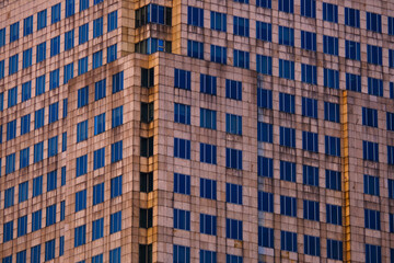 office building The building is adorned with glass. modern against the sky