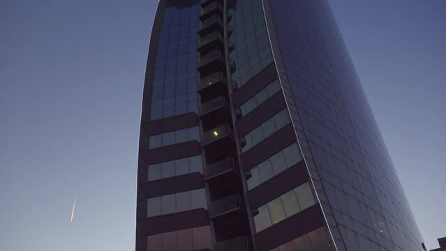 High-rise glass building against the sky