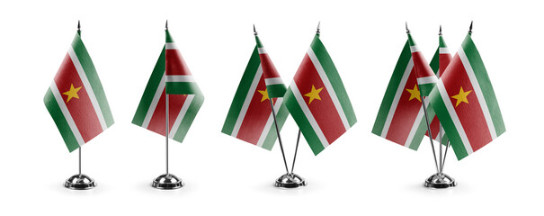 Small national flags of the Suriname on a white background