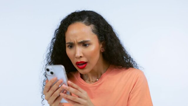 Black woman, surprise face and smartphone with shocked reaction to online news, meme or social media. Technology, communication and announcement with wow expression isolated on studio background