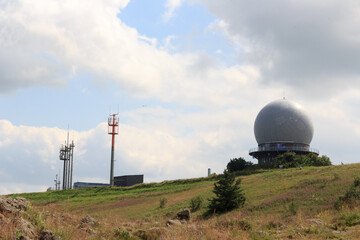 Radar dome on mountain Wasserkuppe with glider (sailplane) in Rhön Mountains, Germany