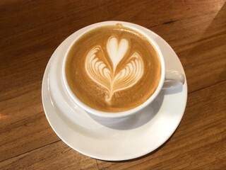 Close-up of cappuccino on table
