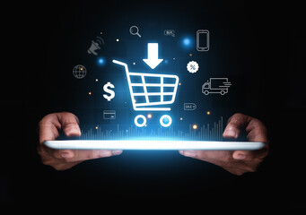 Hand of businessman showing shopping cart icon on tablet.