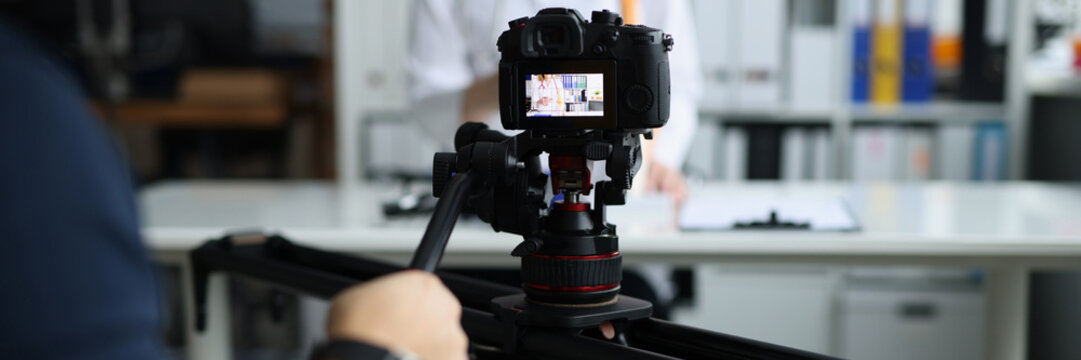 Videographer filming doctor on medical remote training