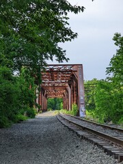 old railway bridge in the woods of new hampshire, new england, in the united states of america