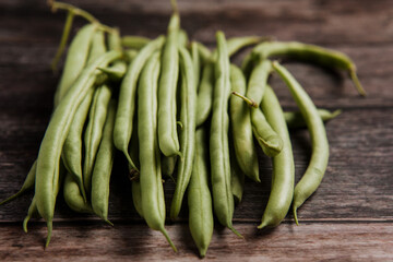 bunch of Fresh green beans at wooden table in Mexico Latin America