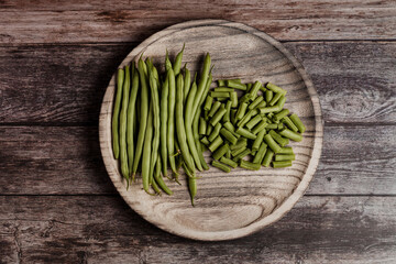 plate of Fresh green beans at wooden table in Mexico Latin America