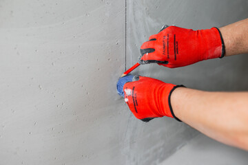 Installation and transfer of a place for an electrical outlet in a concrete wall with a cable recess in a hidden strobe