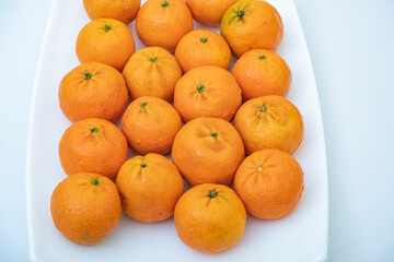 tangerine on a white background.
How to choose, store and how much you can eat so as not to harm the body.