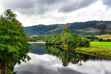 Fototapeta na wymiar River Tay reflections, Scotland, United Kingdom