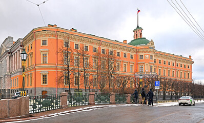 Mikhailovsky Castle and 2nd Engineer Bridge with lattice and lanterns decorated beams crossed spears and spades. Saint Petersburg
