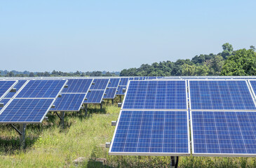polycrystalline silicon solar cells or photovoltaic cells in solar power plant turn up skyward...