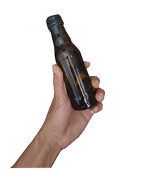 The hand holding a bottle. Isolated on a white background 