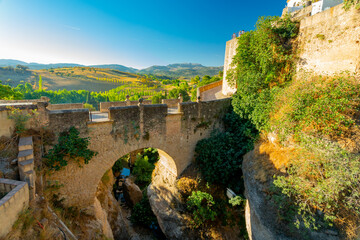 Fototapeta premium Ronda, Spain. Old bridge and Arco de Felipe V