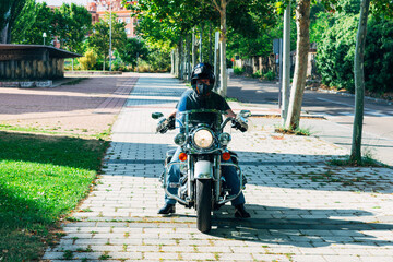 front view of custom chopper motorcycle with biker