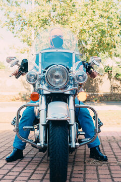 front view of custom chopper motorcycle with biker