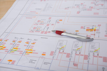 Pen on electrical blueprint, Munich, Bavaria, Germany