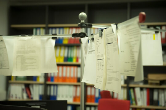 Order forms hanging in office, Munich, Bavaria, Germany
