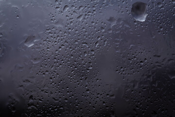 Drops of rain on glass