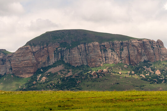 Drakensberg mountain with rock strata visible closeup, a typical mountainous landscape in South Africa use as background or backdrop