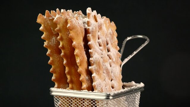 chiacchiere Carnival frappe fried pastry  withi icing sugar