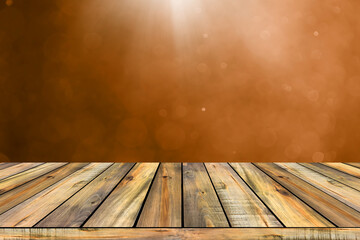 A modern solid wooden outdoor table top setting contrasts in brown orange room background. Idea for wallpaper, banner, brochure, advertising etc., 