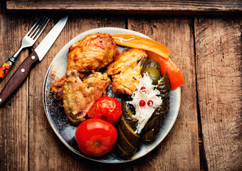 Baked chicken meat and pickles.